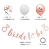 La novia será una combinación de globos de confeti de oro rosa para la decoración de la fiesta de despedida de soltera.