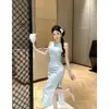 2026 Nuevo Diseño Transfronterizo con un Nuevo Estilo Chino, Vestido Qipao de Longitud Media con Jacquard Mejorado, Corte Entallado