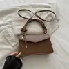 Bolsa pequena estilosa e versátil para mulheres, nova coleção 2026, perfeita para o trabalho e o uso diário, bolsa de ombro chique, bolsa quadrada pequena transversal da moda