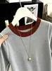 Nueva Camiseta de Punto Casual Elegante de Manga Corta para Mujer Verano 2026 con Hombros en Contraste