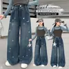 Calça Jeans Feminina Primavera e Outono 2026 Novo Estilo Crianças Maiores Bordado de Estrela Calça de Pernas Largas Calça Longa Feminina de Outono Calça Infantil