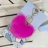 Colgante de Corazón de Peluche Bola de Pelo de Corazón Melocotón Llavero Colgante con Forma de Corazón Correa para Teléfono Móvil Colgante para Colgar en Bolsa Venta al por Mayor