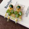 Pendientes vintage de plata antigua de media aguja con borlas de color verde oliva, pendientes vintage exagerados de moda, joyería única con temperamento para mujer.