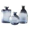 Jarrón pequeño transfronterizo de vidrio para escritorio, mini arreglo floral de boca pequeña, botella de vidrio de color hidropónico, adornos decorativos al por mayor