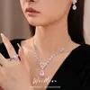 Exquisito collar de flor de circón con forma de gota de agua estilo palacio, cadena para la clavícula de nicho de lujo ligero, juego de joyería de estilo dulce