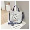 Bolsa de Lona de Osito Lindo para Mujer Estudiante Bolso de Mano para Clase Bolso Cruzado Pequeño Simple Fresco Diario Transfronterizo