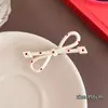 Estilo japonés y coreano, otoño e invierno, ondas simples, puntos, gotas de agua pequeñas, clip de pico de pato, flequillo simple que combina con todo, clip de borde, nicho, tocado exquisito