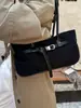 Bolso de hombro de diseño nicho estilo coreano para mujer, otoño temprano 2026, bolso de mano retro a la moda para el trabajo, bolso de axila de lujo ligero de alta gama