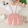 Conjunto de dos piezas de verano para niñas: Conjunto Infantil de Falda Plisada con Tirante de Lazo 3D y Camiseta Estampada de Manga Corta