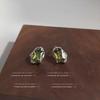 Pendientes de circonita líquida verde oliva de nicho, pendientes femeninos de moda de alta calidad, pendientes con personalidad y temperamento únicos.