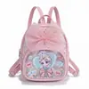 Mochila nueva y linda para niñas con lazo, ligera y versátil, elegante bolsa escolar para jardín de infantes, mochila escolar de dibujos animados de alta apariencia