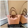 Bolso de mano para mujer estilo coreano 2026 modelo nuevo con diseño de color contrastante, moda de nicho bolso de hombro de gran capacidad