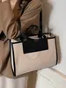 Bolsa de Lona Casual de Grande Capacidade para Mulheres 2026 Nova Moda Bolsa de Mão para o Trabalho Cotidiano Bolsa Tote de Trabalho Simples e Versátil