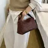 Bolsa Feminina Clássica Nova Outono 2026 Bolsa de Mão Versátil Design de Nicho de Alto Padrão Bolsa de Ombro Transversal Bolsa de Mão
