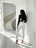 Jeans Ajustados Blancos Lavados Estilo Europeo y Americano para Commuter, Pantalones de Lápiz Ajustados con Dobladillo Enrollado, Moda para Mujer Directo de Fábrica