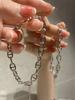 Pulsera de nariz de cerdo de celebridad en línea para mujer, hip hop nicho linda simple pulsera de moda versátil de alta gama nueva joyería de mano
