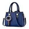 Bolso 2025 Nueva Moda Versátil Bordado Bolso de Mano para Mujer Bolso de Hombro Cruzado con Colgante de Borla Bolso de Viaje para Mujer