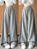 Pantalones de chándal grises a rayas para niños y niñas Otoño 2026 Nuevos Pantalones casuales de pierna ancha de cintura alta Pantalones de chándal rectos estilo retro americano