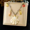 Colección de Collares Coloridos Estilo Océano con Goteo de Aceite, Cadena para Clavícula de Concha Estrella de Mar Sol Perla de Imitación, Joyería al por Mayor Estilo Vacacional