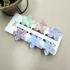 Clipes de Cabelo Coloridos de Flor de Plumeria de 4cm Mais Vendidos na Europa e América, Grampos de Cabelo Florais Transfronteiriços, Acessórios de Cabelo da Moda para Festas na Parte de Trás da Cabeça