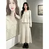 Conjunto completo de outfit estilo coreano para mujer, nueva colección otoño e invierno, conjunto de dos piezas de suéter de punto pesado con lazo y falda, moderno