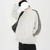 Sudadera cárdigan retro a rayas estilo deportivo para hombre, con corte relajado y holgado, adecuada para el uso diario en primavera y otoño, con cuello alto y cierre de cremallera