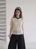 Camiseta de punto de manga corta con cuello polo hueco color avena para mujer, diseño holgado de verano, top de nicho con cuello de solapa