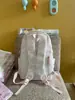 Gris claro con acentos en rosa suave, discreta y duradera, mochila estilo coreano para chicas de secundaria y preparatoria