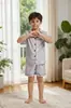 Ropa Europea y Americana para Niños 2026 Primavera y Verano Nueva Estampado de Dibujos Animados Conjunto de Pijama Corto de Manga Corta para Niñas Bebé