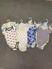 Ropa de bebé con cuello Ropa de triángulo de manga corta de cinco colgantes Mono ropa para trepar Triángulo de manga corta.