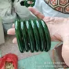 Pulsera de jade al por mayor de fábrica material de Mongolia Exterior imitación alta de jade Hetian pulsera de barra redonda gruesa de jade suministro en vivo de pulsera de jade