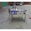 Máquina llenadora de pasta líquida de doble cabezal máquina automática de envasado de detergente pequeña máquina llenadora de botellas de bebidas de pistón