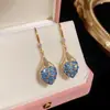 Últimos Pendientes Explosivos de Lujo Completo con Diamantes Amor Moda Temperamento Joker Pendientes de Mujer de Gama Alta Venta al por Mayor de Fábrica