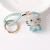 Colgante de bolso de gatito con incrustaciones de diamantes de dibujos animados, llavero de coche superbrillante con diamantes de arcilla, regalo pequeño para máquina de cápsulas al por mayor
