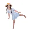 Maiô infantil com gola de boneca verão novo estilo saia de natação xadrez de secagem rápida maiô vestido para crianças de meia-idade e grandes moda praia infantil