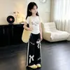 Conjunto de Dos Piezas de Moda Verano 2026 Estilo Coreano Pantalones Largos con Lazo Elegante Único Pantalones de Pierna Ancha con Encaje Conjunto Casual de Manga Corta