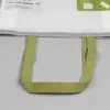 Película impermeable impresión a color bolsa tejida de PP portátil promoción publicitaria cremallera de piel de serpiente tejida bolsa de compras peritoneal portátil