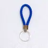 Nuevo llavero de cuerda de cuero tejido, llavero colgante creativo para mochila, llavero para empujar, pequeño regalo, llavero para coche al por mayor