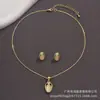Paquete Individual Ojo de Gato Blanco Cadena de Oro Real Conjunto de Colgante y Aretes para Mujer Collar de Oro Regalo Estilo Nuevo