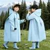 Impermeable infantil para estudiantes de primaria y secundaria, apto para niños y niñas, con ala engrosada, diseñado para ciclismo al aire libre y con espacio para mochila