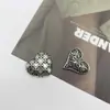 Nuevos Accesorios de Corazón Cruzado Joyería Personalizada Estilo Oscuro Parche de Aleación Hecho a Mano Accesorios para el Cabello Flores para Zapatos Materiales DIY