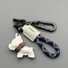 Llavero Colgante de Cachorro Bulldog Francés Lindo de Dibujos Animados Anillo para Llavero de Coche Colgante de Bolsa de Cuerda Tejida a Mano de Cuero