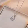 Nuevo diseño hipster colgante de luna y planeta de diamantes completos engaste de cobre circonita cadena de clavícula de moda collar de temperamento versátil para mujer