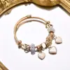 Exportación Transfronteriza Más Vendido 2025 Panjia Nuevo Bronce Lujo Accesible Encaje Corazón DIY Pulsera de Cuentas Joyería
