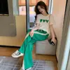 Conjunto de Moda Casual Feminino Verão 2024 Novo Elegante Redutor de Idade Emagrecedor Camiseta de Manga Curta Calça Esportiva de Perna Larga Conjunto de Duas Peças