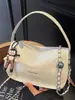 2026 Nuevo Bolso de Mano Tofu de Alta Apariencia Simple de Moda Bolso Cruzado Versátil con Cadena Elegante Casual para el Trabajo