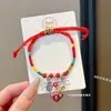 Pulsera de Hilo Rojo de Bebé de Dibujos Animados 2026 Nuevo Estilo Bendición Pequeño Zongzi Pulsera Estilo Chino Festival del Bote del Dragón Hilo de Cinco Colores Ajustable Venta al por Mayor