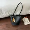 Bolso de cubo de nicho transfronterizo para mujer, nuevo bolso de mano versátil de moda 2026 con patrón de lichi, bolso de hombro cruzado