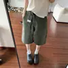 Retro Americano Verde Militar Ropa de Trabajo Cinco Puntos Pantalones Cortos de Mezclilla Hombres 2026 Verano Nuevo Diseño con Sentido Adelgazantes Pierna Ancha de Longitud Media