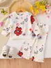Comércio Exterior Roupas Infantis para Bebês Meninas e Meninas Jovens, Moletom com Estampa de Coração Floral de Manga Longa + Calça Flare, Conjunto de Moletom de Duas Peças